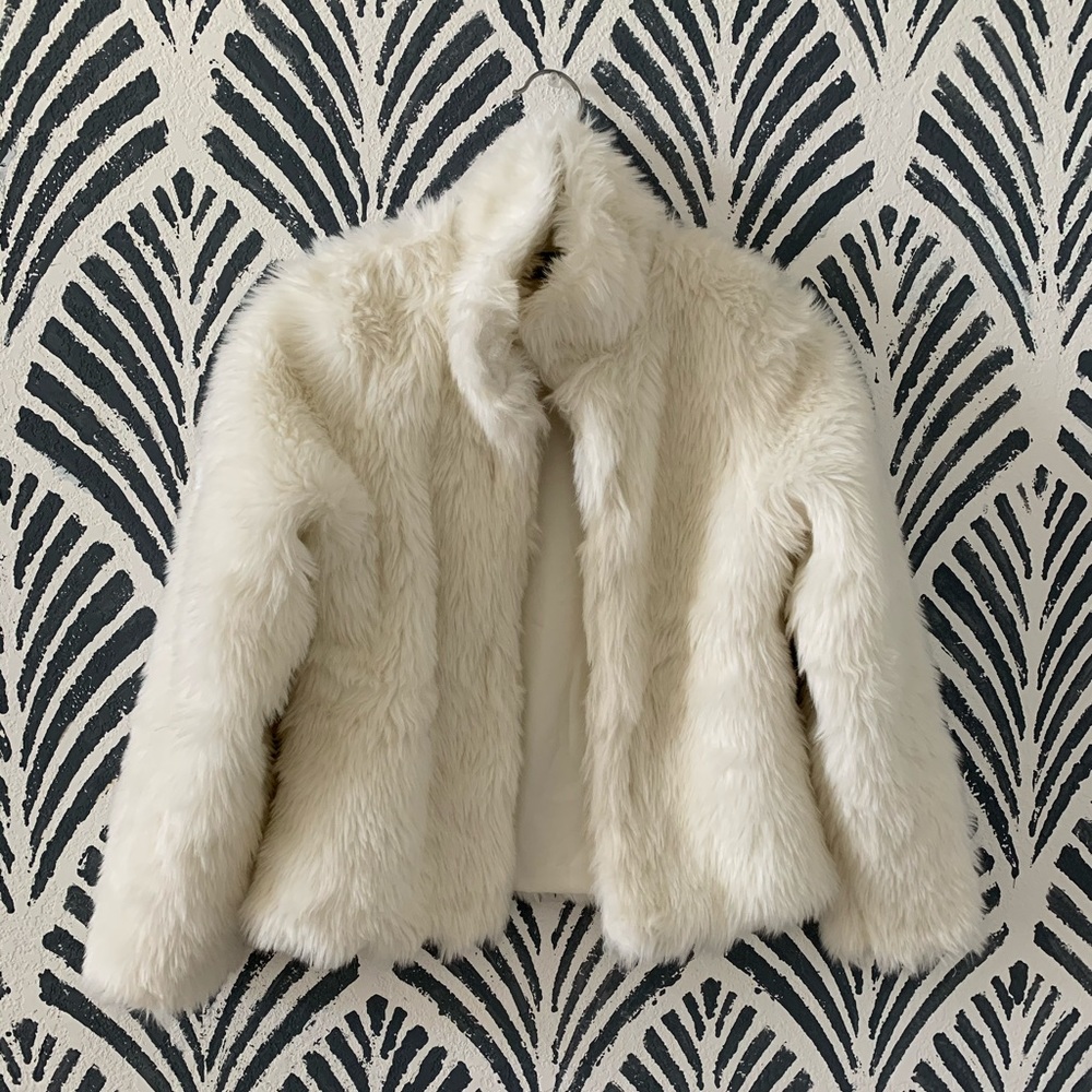 White faux fur coat. Never worn.